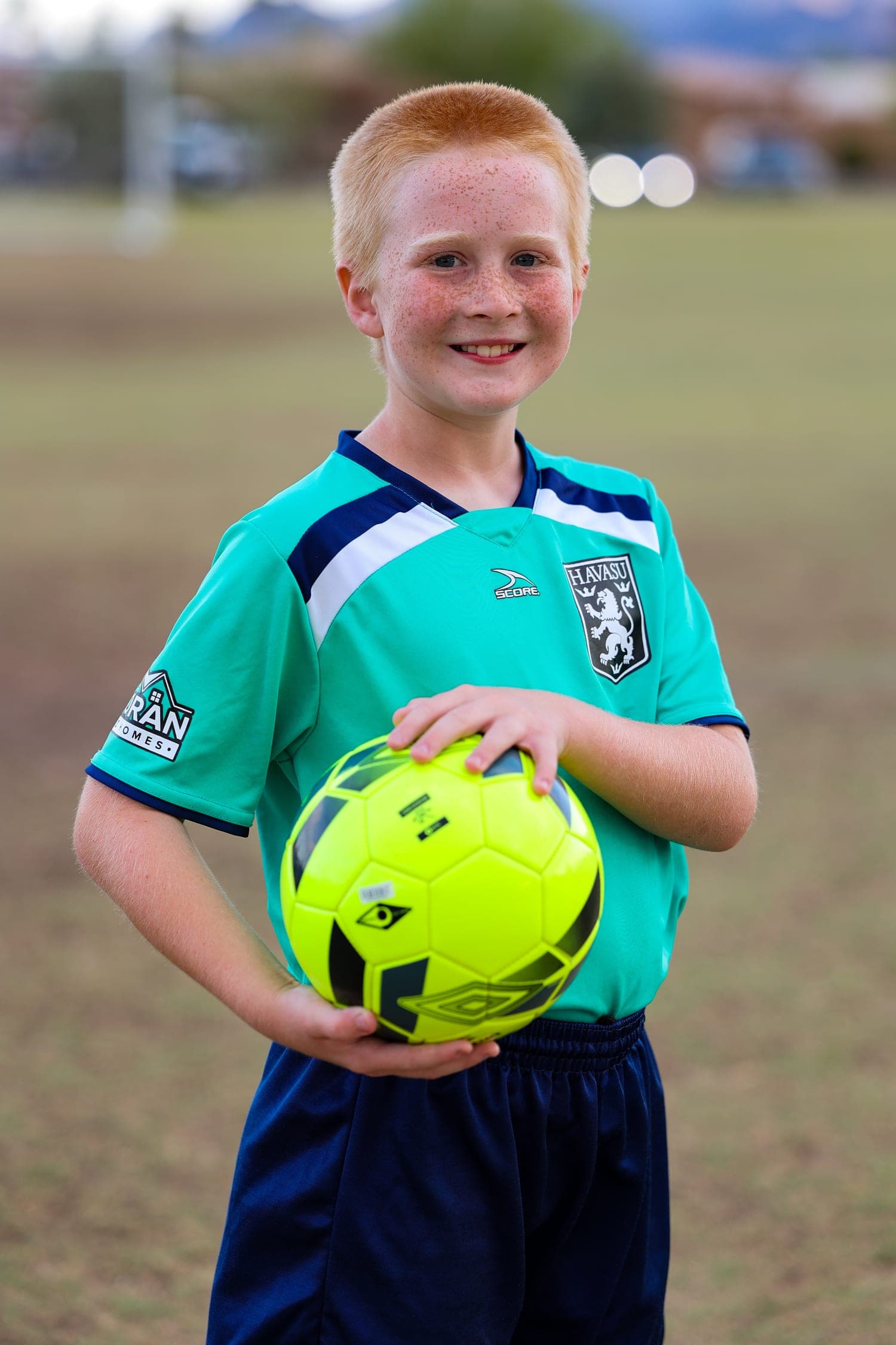 Youth soccer player in action on the field